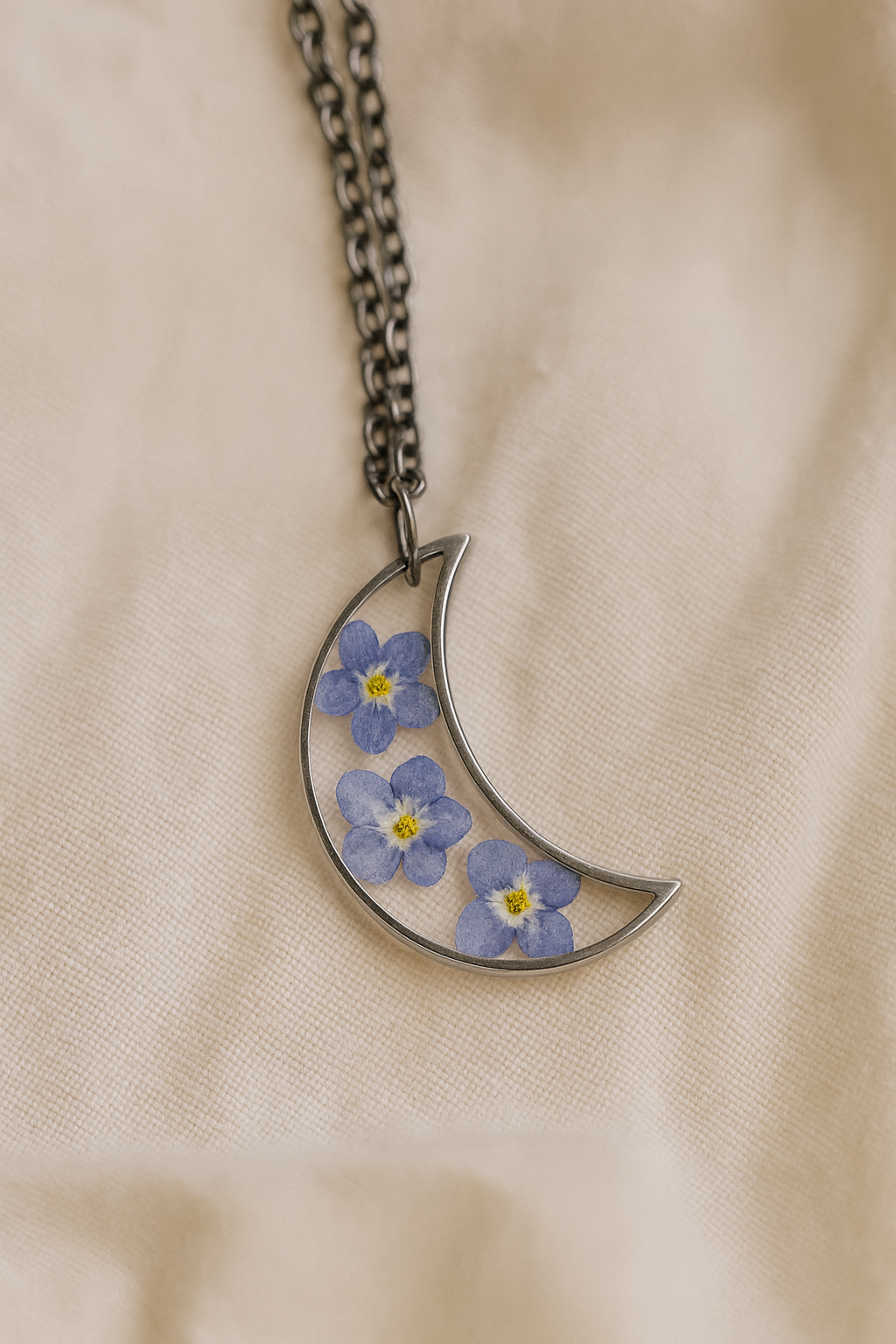 FLO's Celestial Memory Moon Pendant – Forget-Me-Not Edition